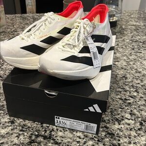 Adidas Pro 4 shoes with Black and Red Accents